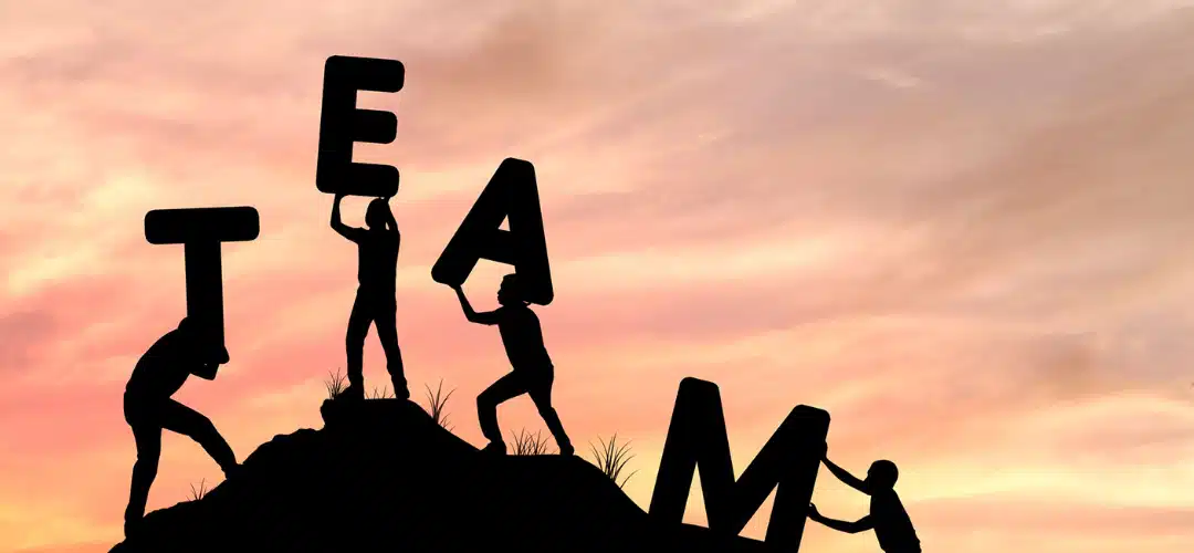 Clinicians working together to spell the word team