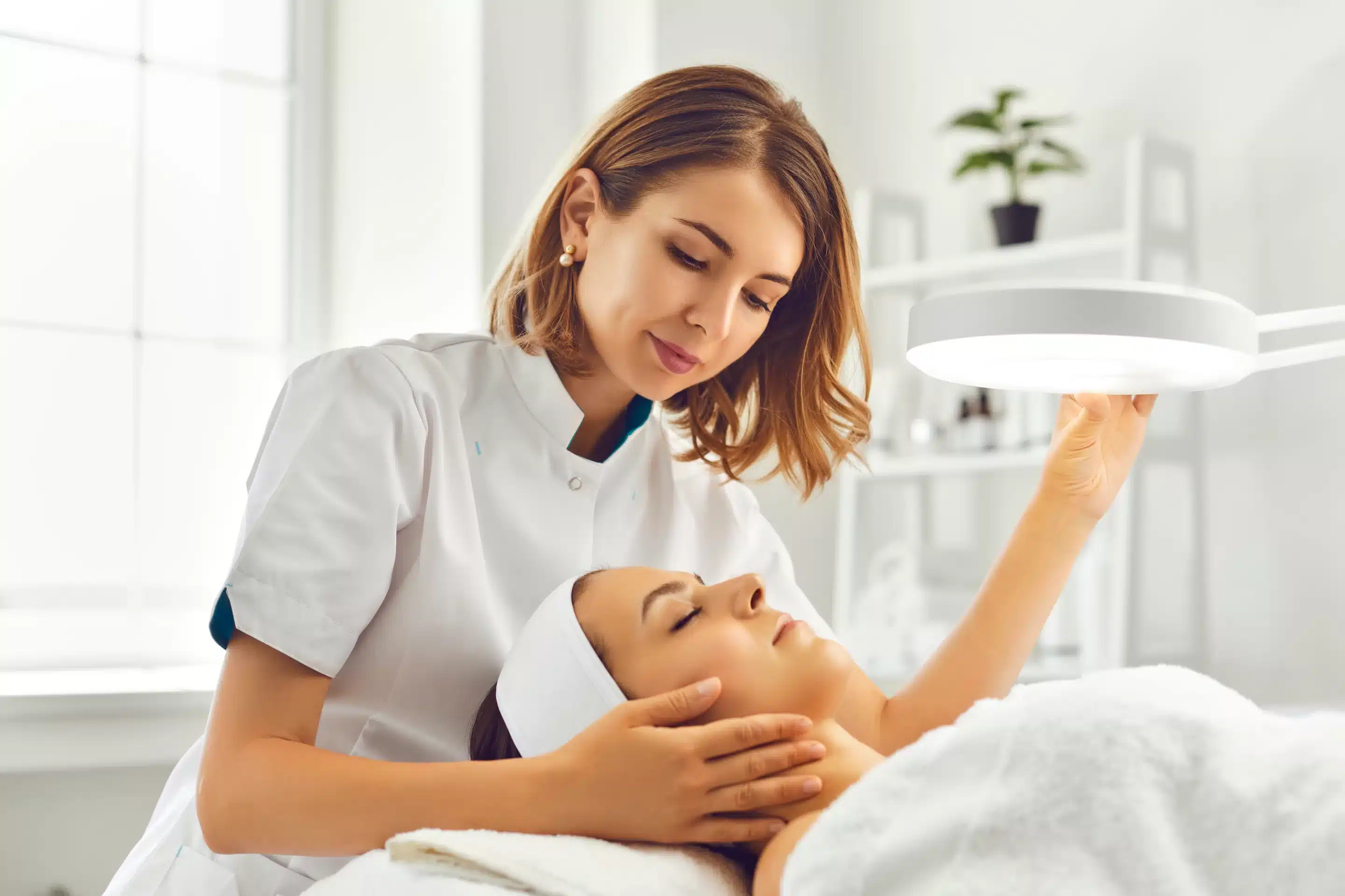 a woman getting a facial massage