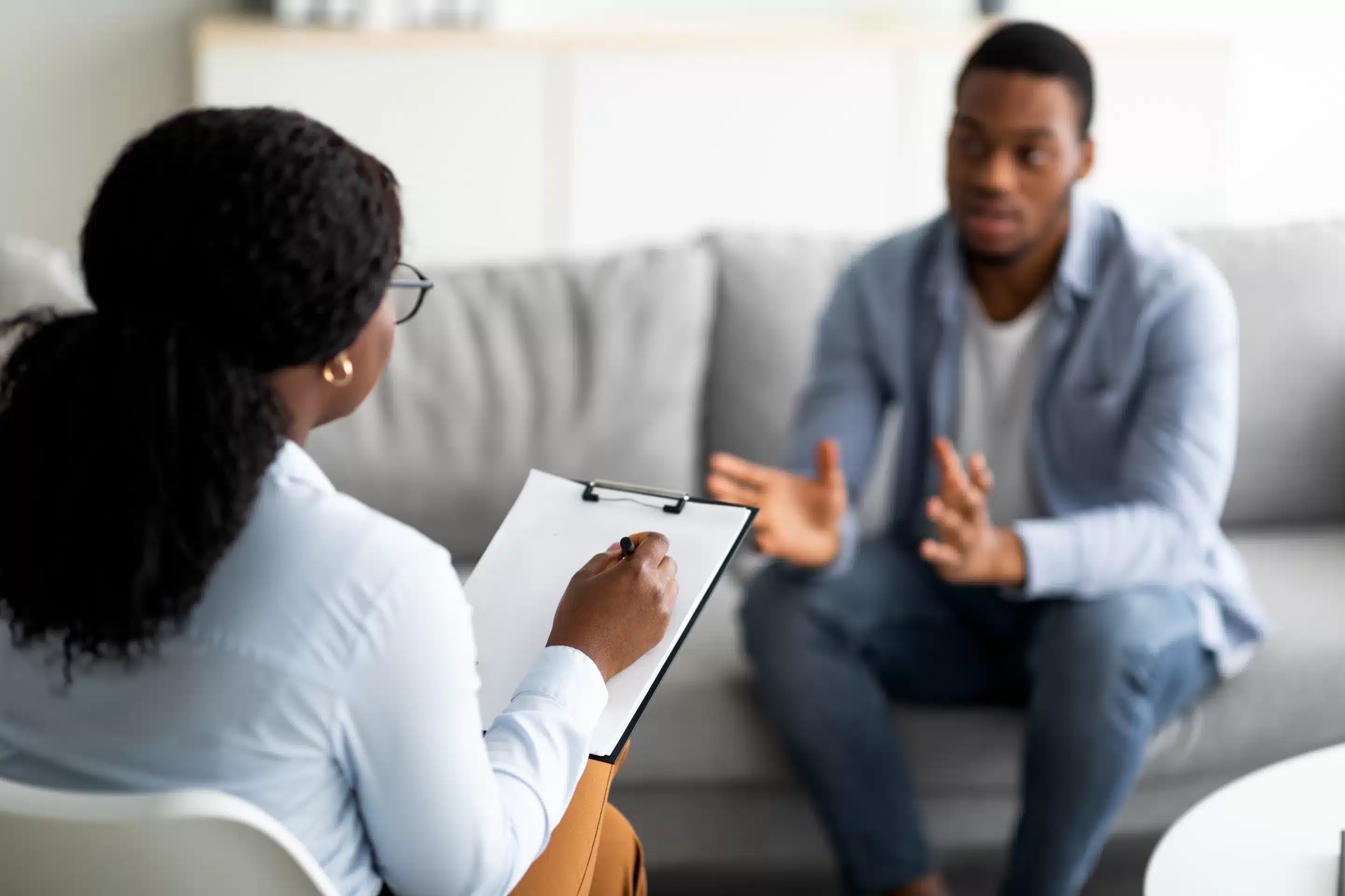 Psychological assistance. Millennial black man with depression