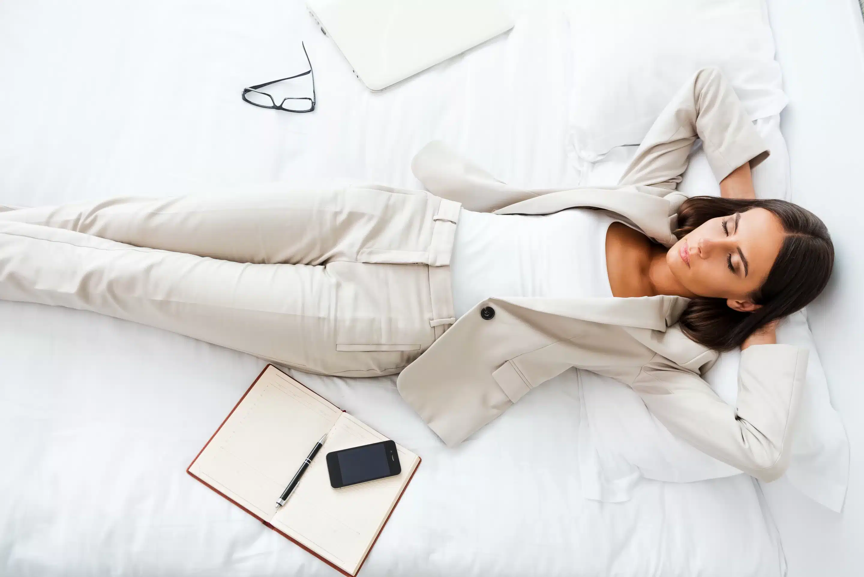 a woman lying on a bed