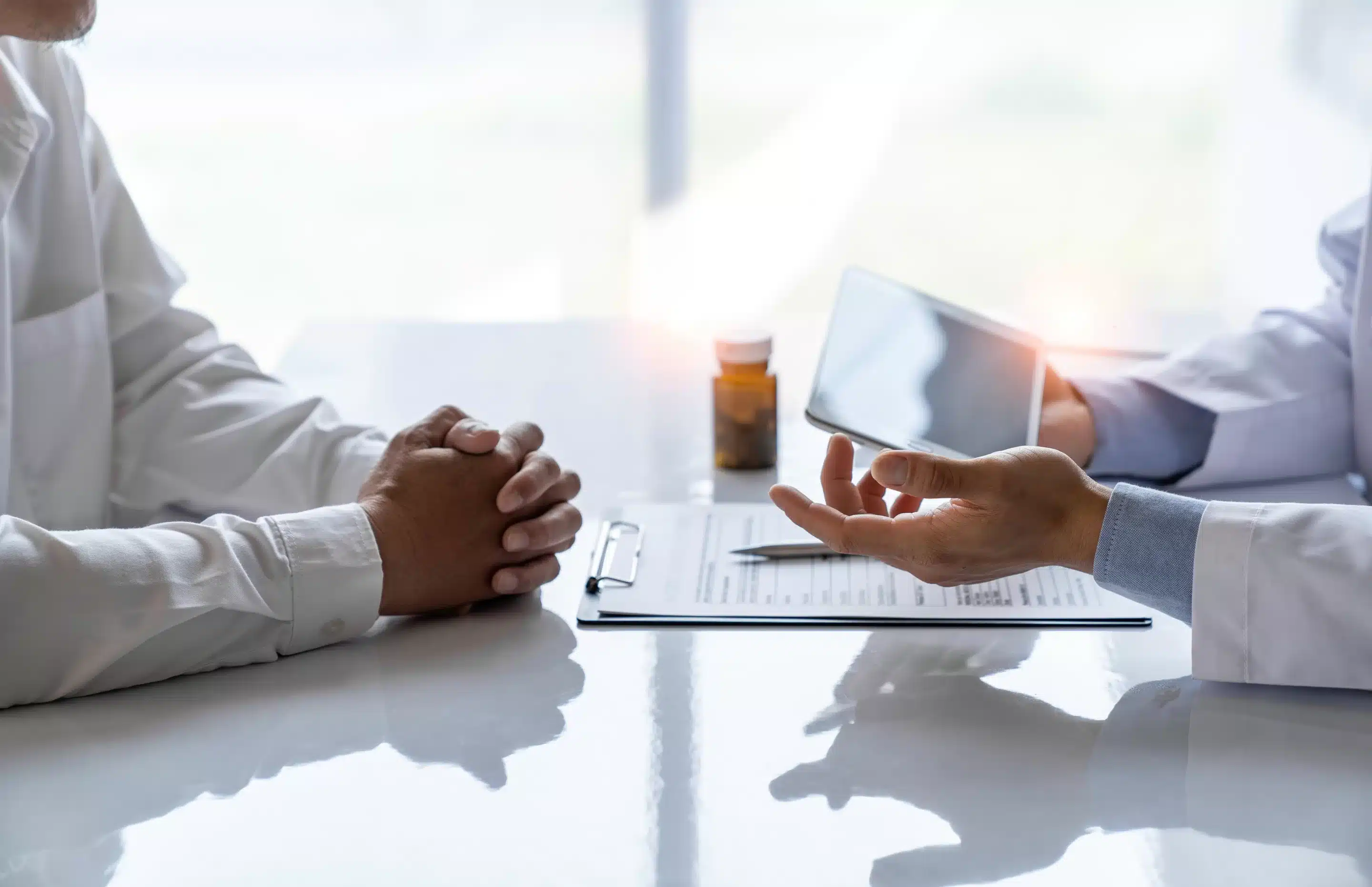 doctor and patient Providing advice on medication and treatment