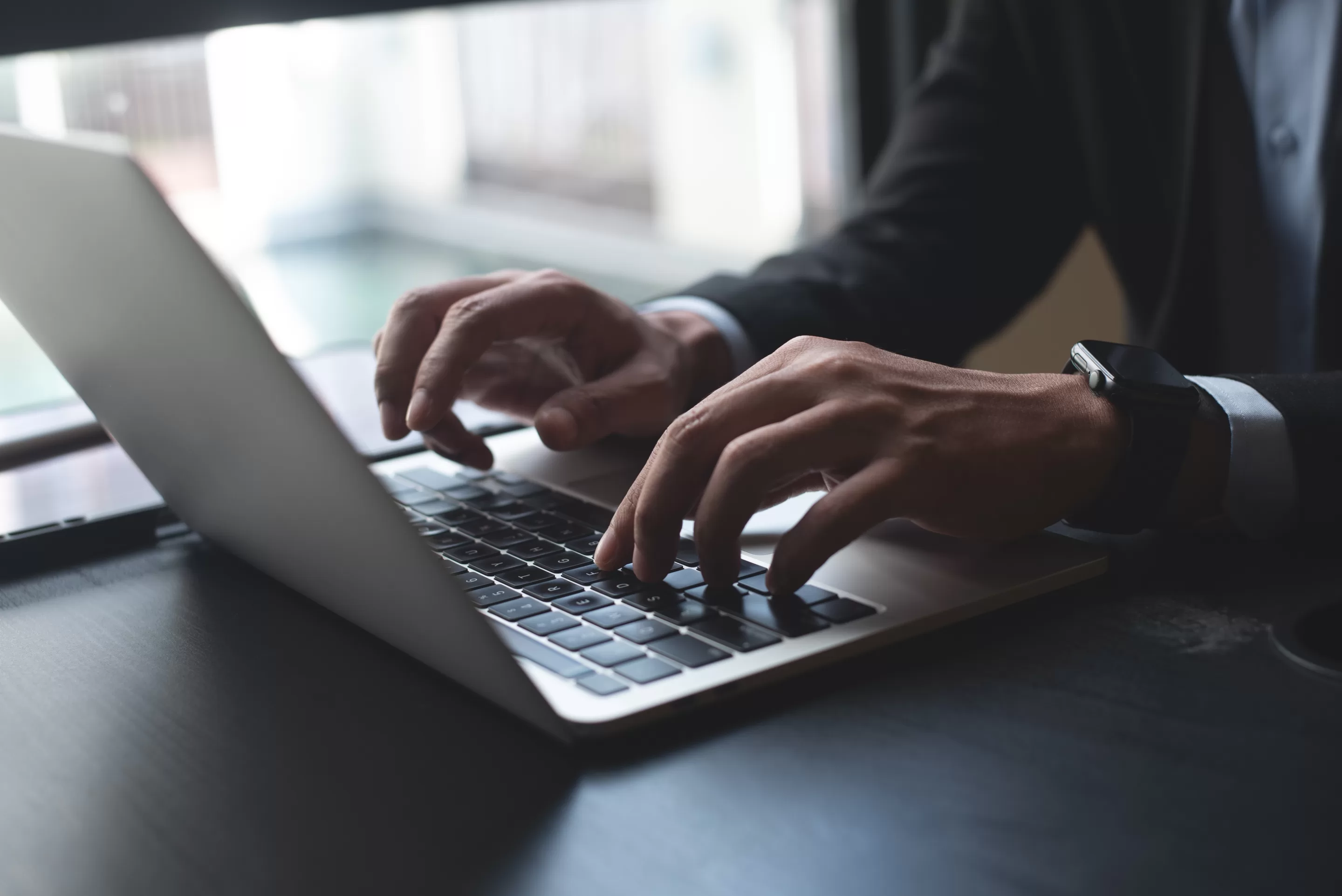 person using laptop computer