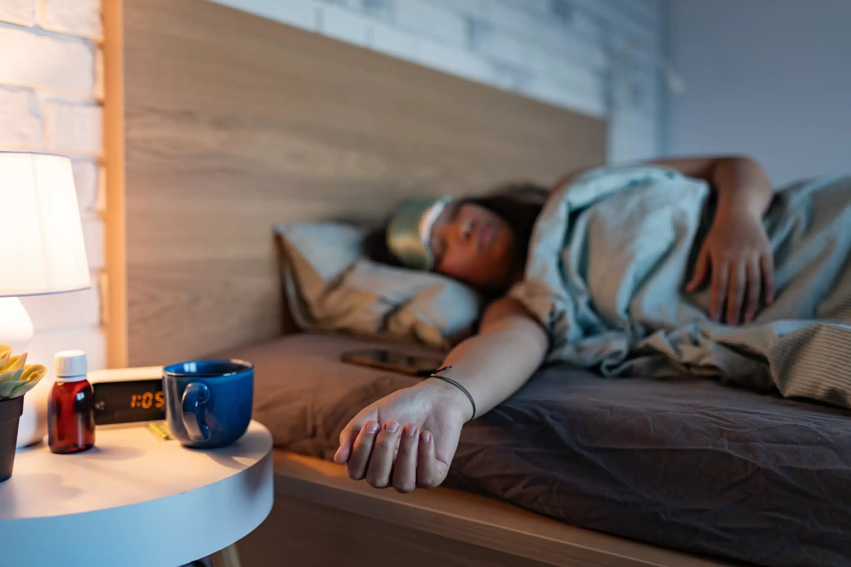 Woman sleeping with sleep mask, using sleepin