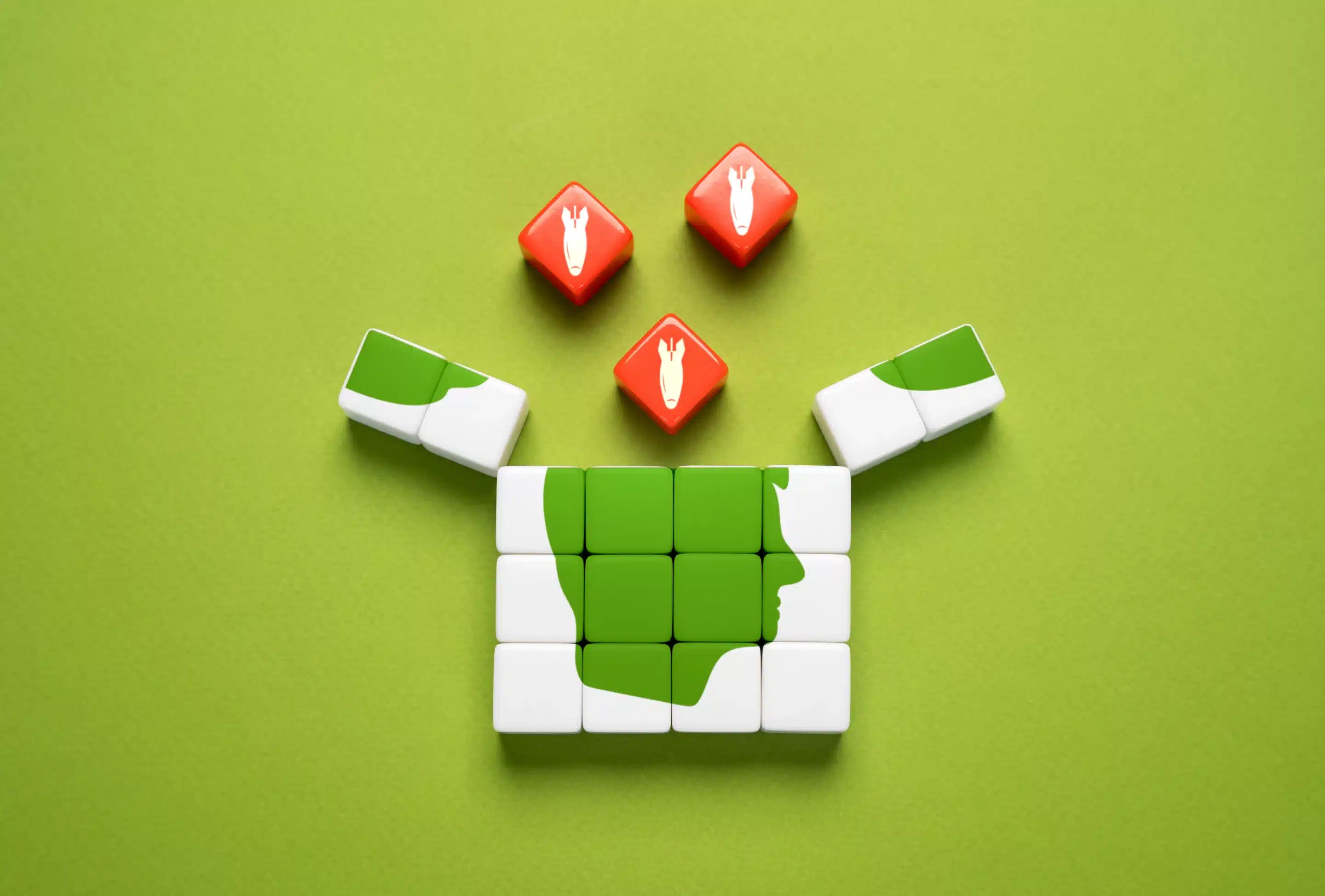 a group of cubes with faces and a rabbit on them