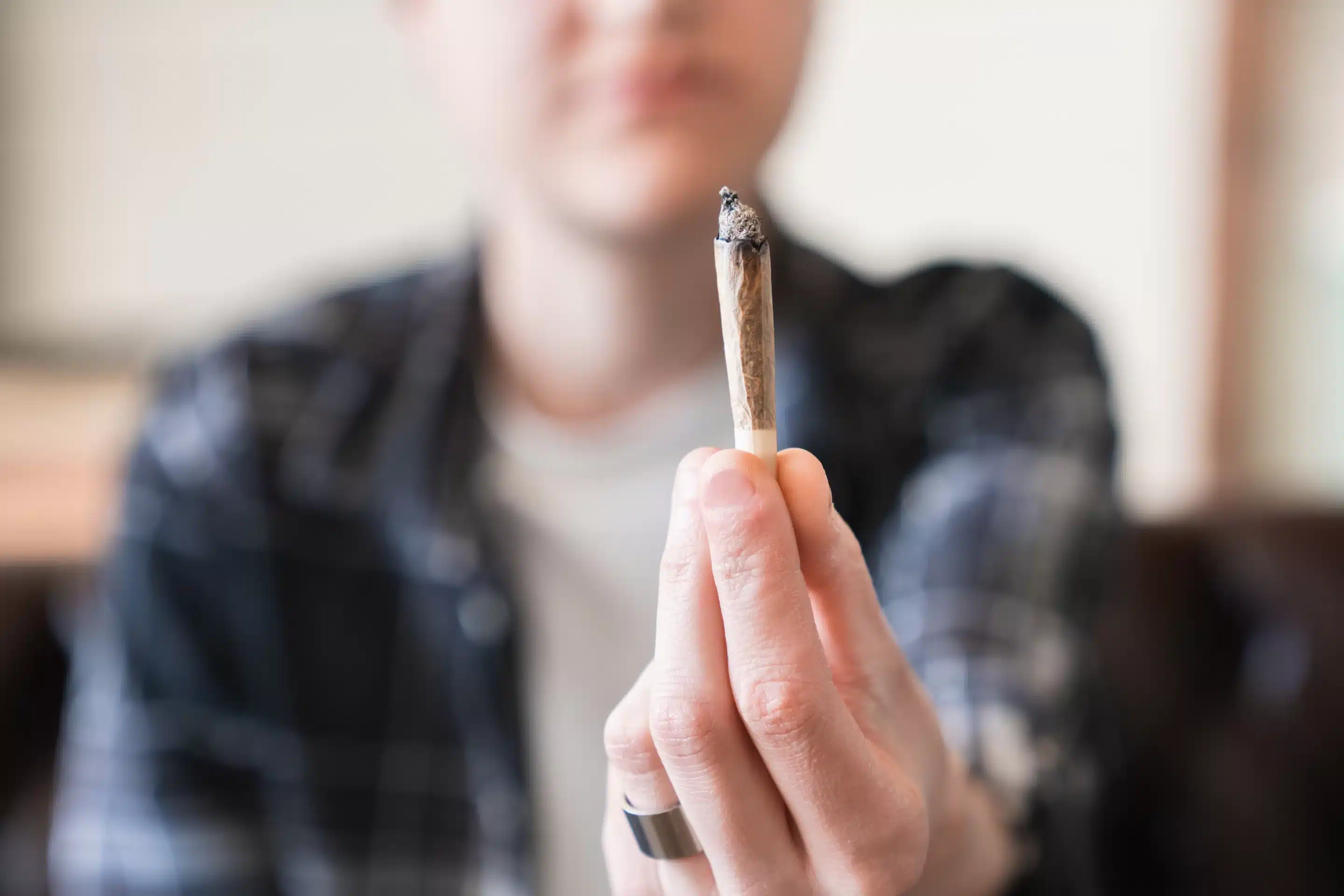 Close up image of weed joint with smoke. Legalization of marijuana cannabis