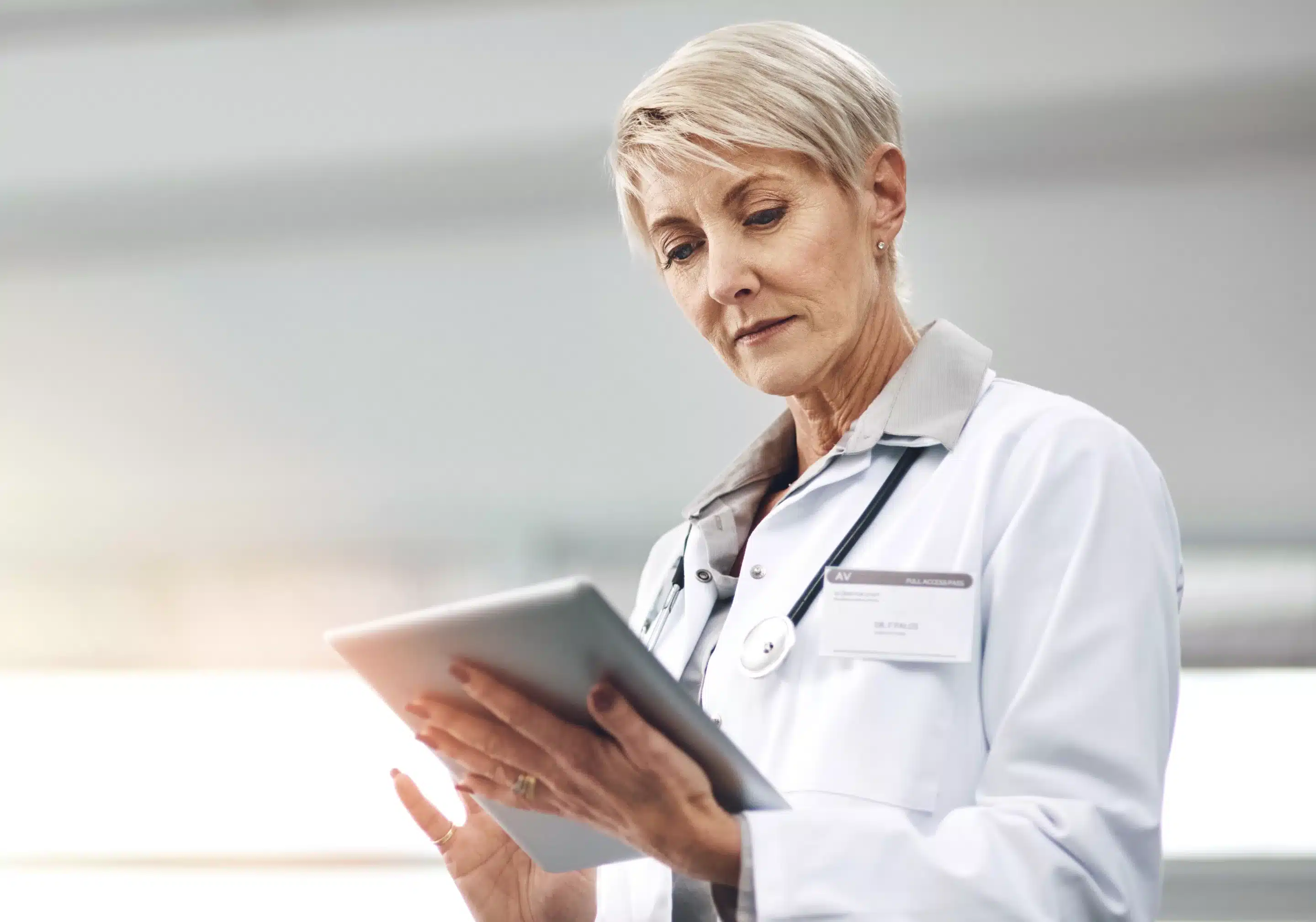 Private Practices owner reviewing material on a tablet