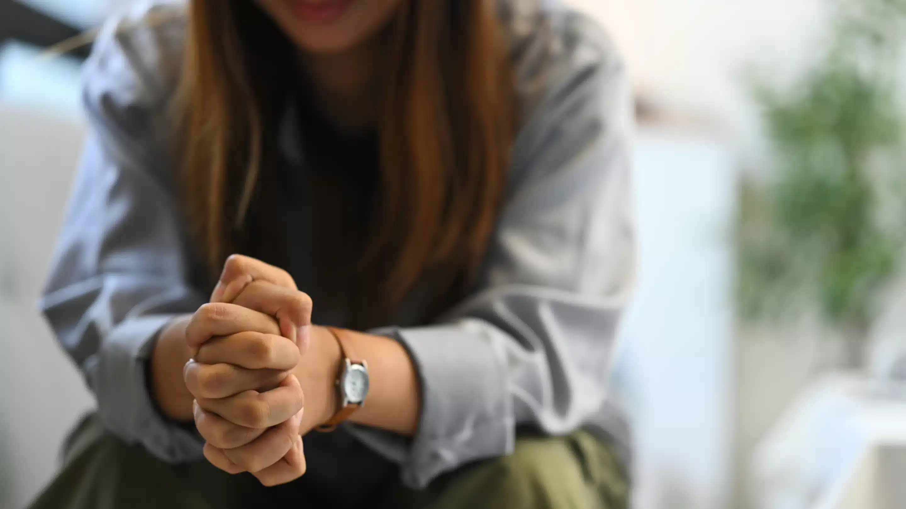 Depressed sad woman sitting alone