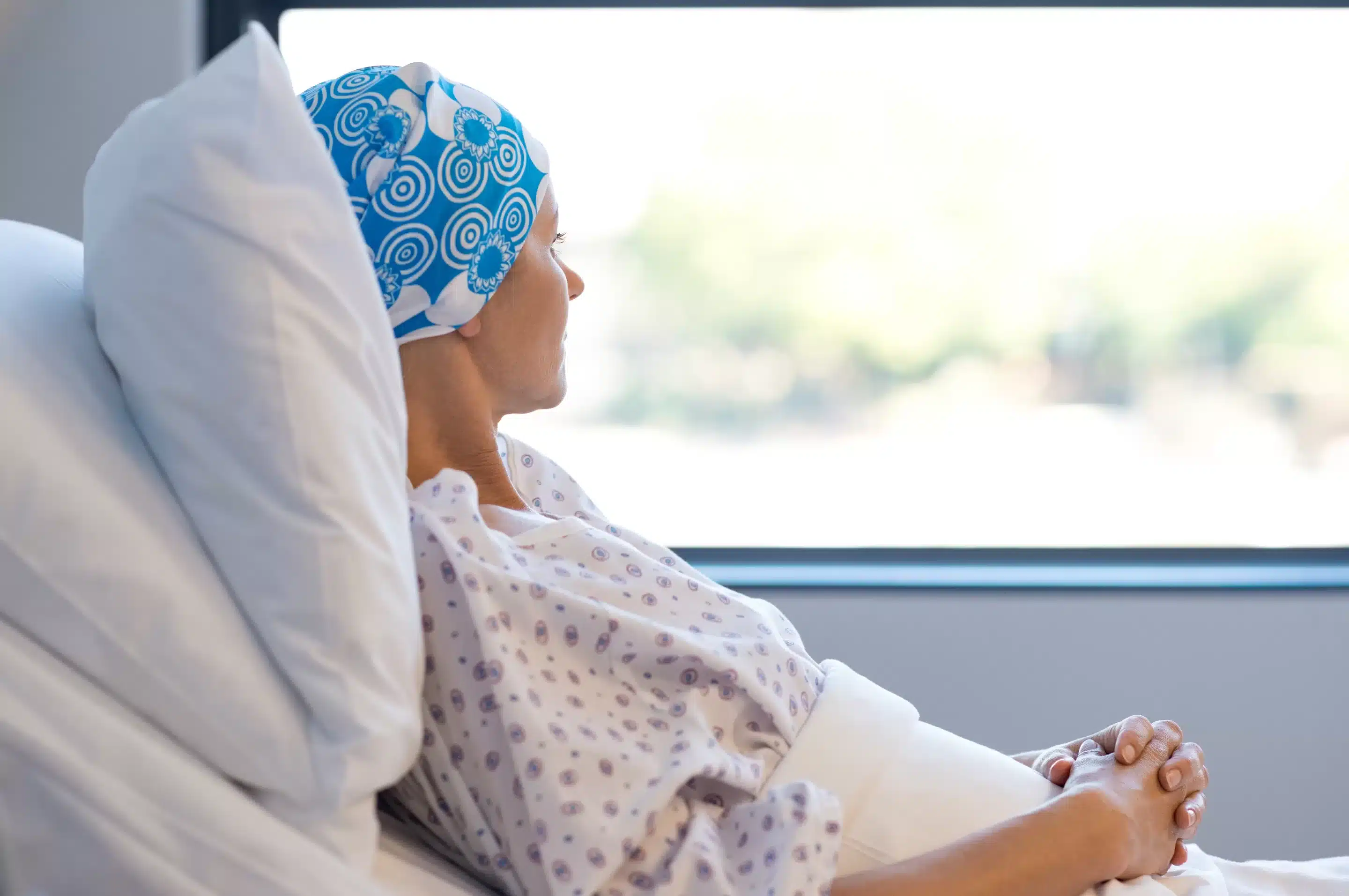 a woman in a hospital gown