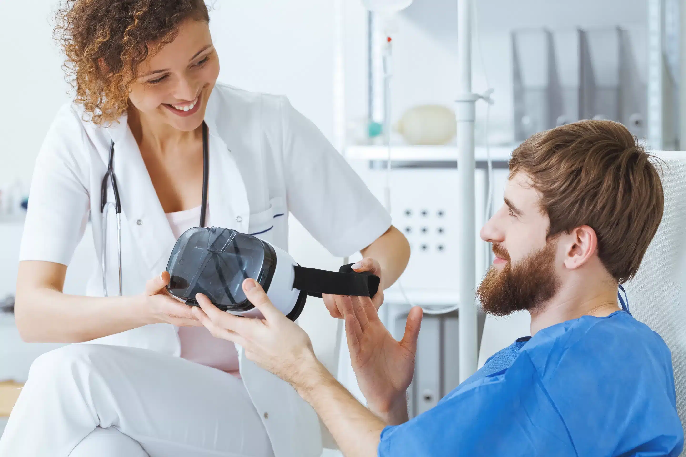 Occupational therapist using virtual reality technology in hospital