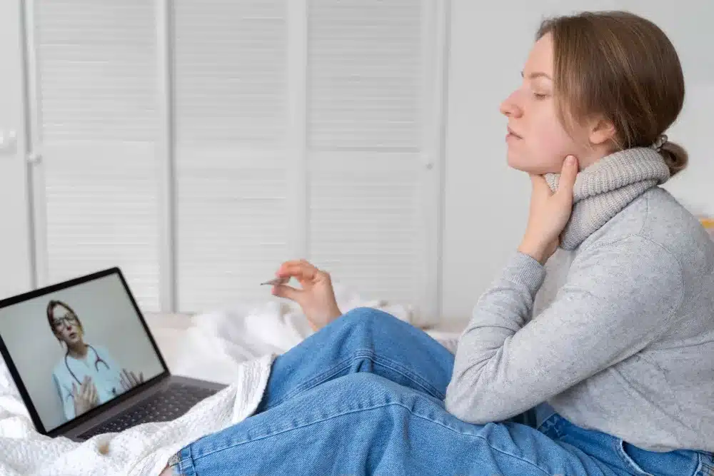 a woman smoking a vaporizer