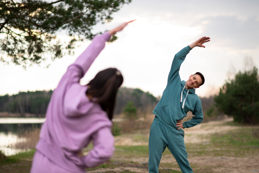 Medium shot of a couple exercising together, promoting fitness and partnership