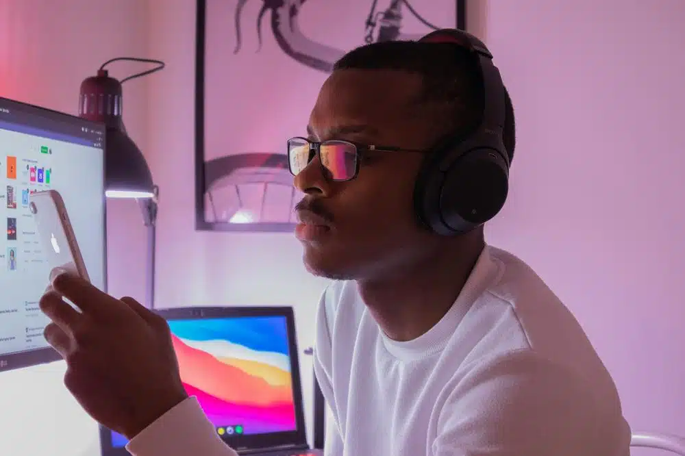 man in white crew neck shirt wearing black headphones - adhd