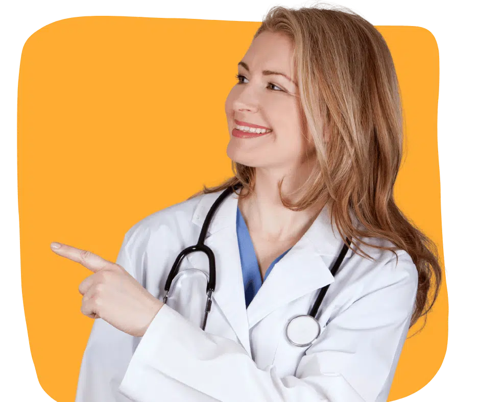 Male Nurse in a clinic waving during a video call on a laptop during Telemedicine